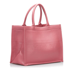 Livre dior Tote Cuir en relief rose moyen